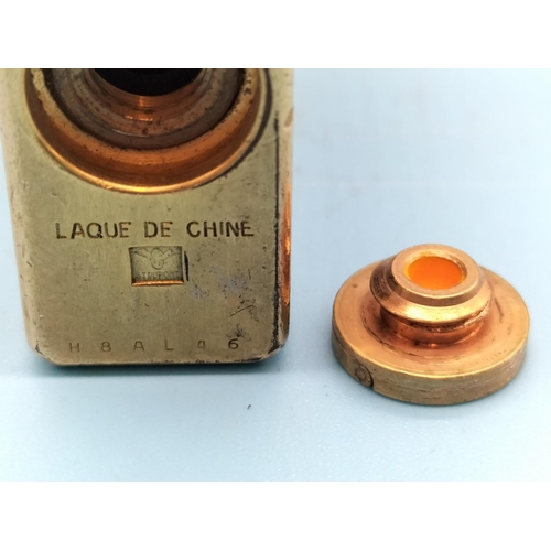 304 - Dupont (France) Orange Insert Lighter. No H8AL46. 4.5cm x 3.5cm. Slight Dent to Body.