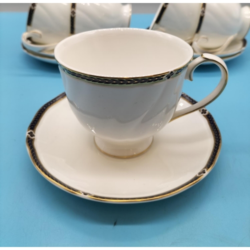 665 - Wedgwood Cups and Saucers (6) in the 'Royal Lapis' Pattern.