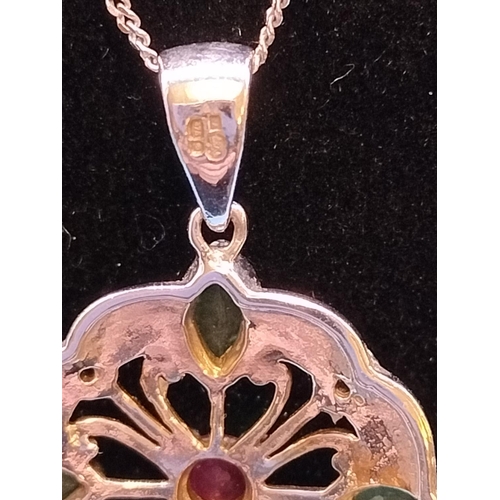 699 - 9ct 375 White Gold Diamond, Emerald and Ruby Pendant on White Gold Chain.