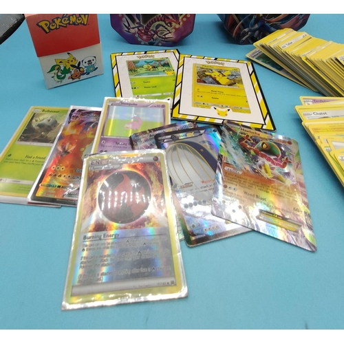 798 - 2 x Pokemon Tins with Assorted Cards and Accessories.