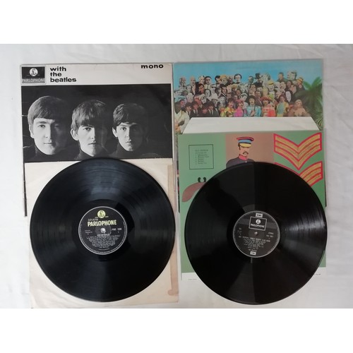 134 - The Beatles 3x Lp to include 