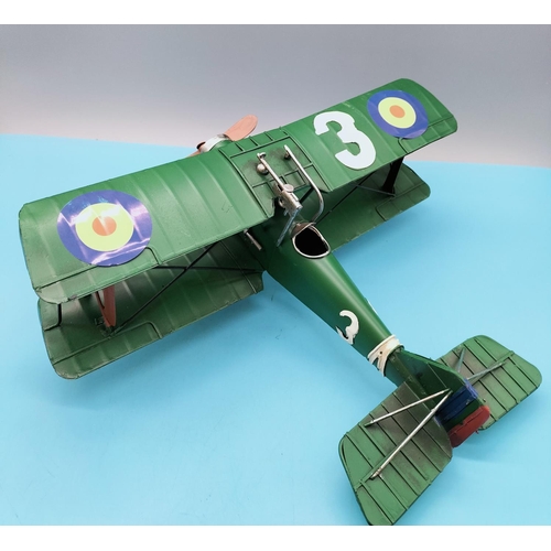 103 - Boxed Tin Model of an Aeroplane. 30cm high x 28cm.