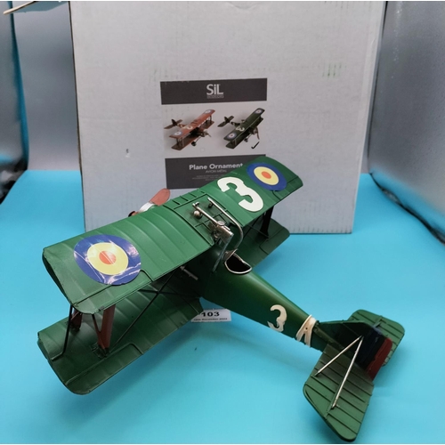 103 - Boxed Tin Model of an Aeroplane. 30cm high x 28cm.