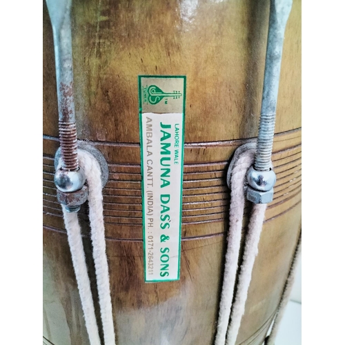 105 - Jamuna Dass & Sons, India 7 m.m Double Ended Drum. 60cm High. Requires Re-Skinning to One End.