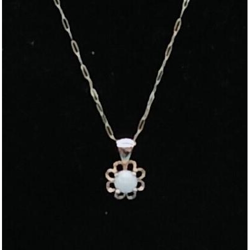 115 - 375 9ct Gold Opal set Pendant and Chain.