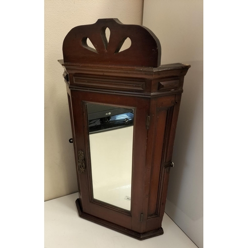 301 - Antique Mirror Front Corner Cupboard. 69cm High, 27cm x 27cm. This Lot is Collection Only.