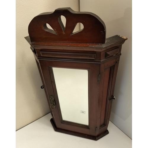 301 - Antique Mirror Front Corner Cupboard. 69cm High, 27cm x 27cm. This Lot is Collection Only.