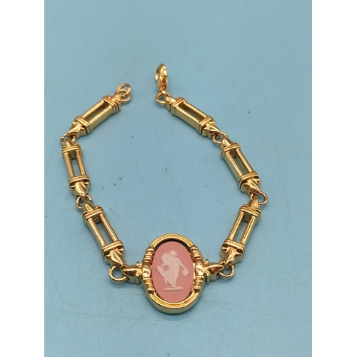 309 - Yellow Metal and Pink Jasper Bracelet.