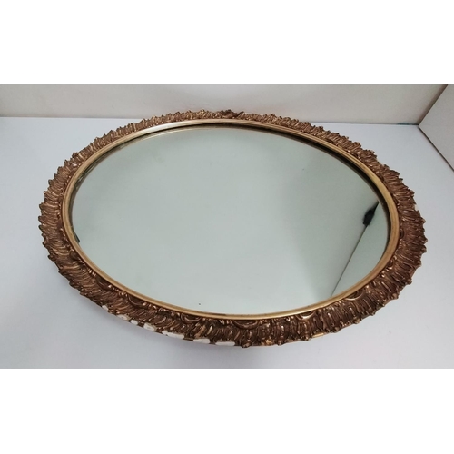 641 - Gold Gilt Oval Mirror. Some Damage to Gilt. 66cm x 56cm. This Lot is Collection Only.