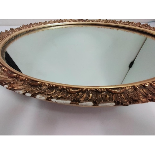 641 - Gold Gilt Oval Mirror. Some Damage to Gilt. 66cm x 56cm. This Lot is Collection Only.