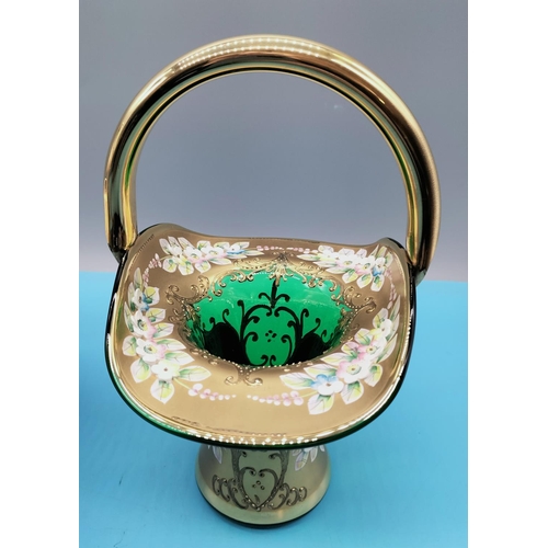 87 - Coloured Glass Baskets (2) with Gold and Enamelled Flowers. 23cm High, 16cm x 14cm.