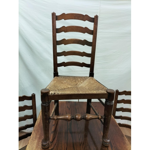 30 - Oak Refectory Dining Table with Set of 4 Oak Country Ladder Back Chairs with Rush Seats plus Carver.... 