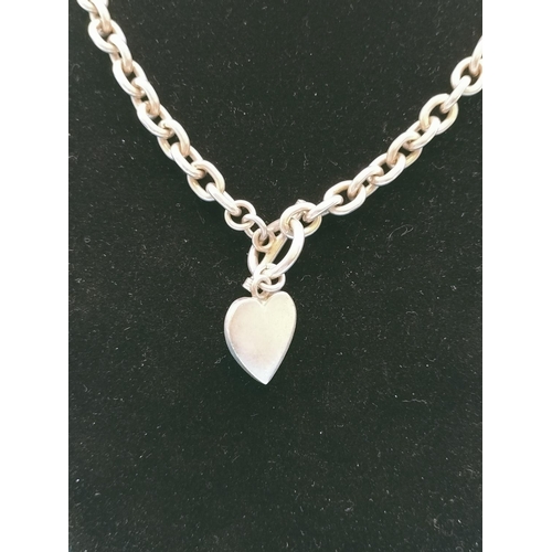 38 - T-Bar Silver Necklace, Stamped 925 with Heart Pendant. 56 Grams.