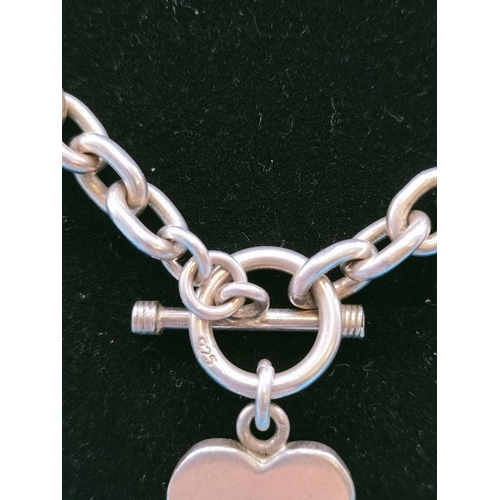 38 - T-Bar Silver Necklace, Stamped 925 with Heart Pendant. 56 Grams.