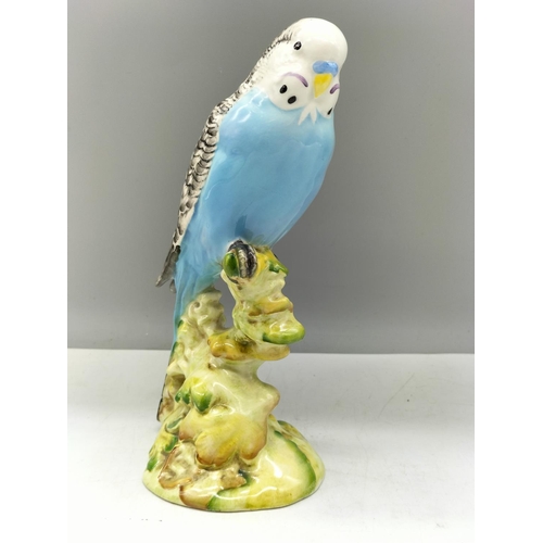 58 - Beswick Figure of a Blue Budgie No 1217. 18cm High.