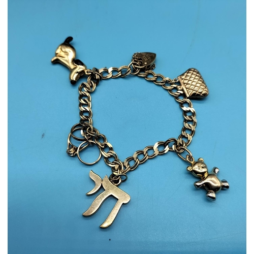 1 - 9ct Gold Charm Bracelet with Charms. 14.5 Grams.