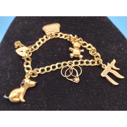 1 - 9ct Gold Charm Bracelet with Charms. 14.5 Grams.