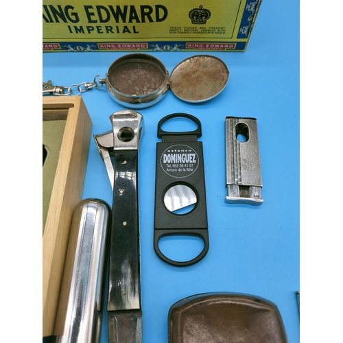 103 - Collection of Cigar Cutters, Tubes and Cases.