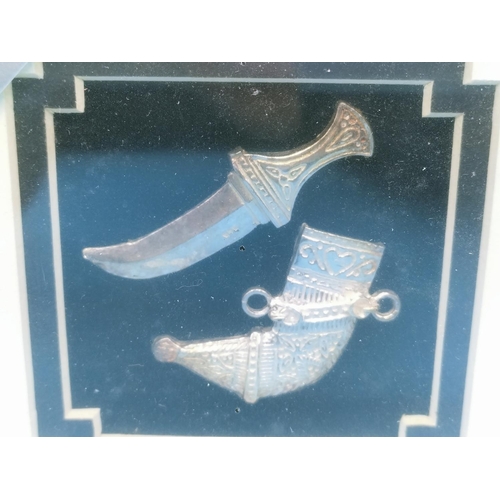 397 - Sealed Sterling Silver Framed Kurki Knife and Holster. 17cm x 17cm.