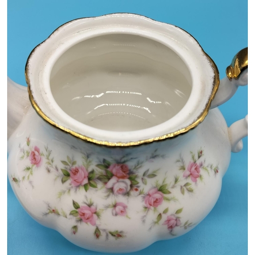 414 - Paragon China Teapot in the 'Victoria Rose' Pattern. 15cm High, 19cm Handle to Spout.