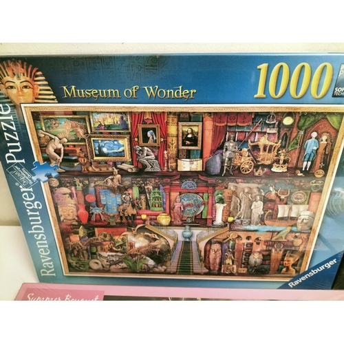 519 - New and Sealed Jigsaw Puzzles (4) - 3 x 1000 Piece plus a 300 Piece.