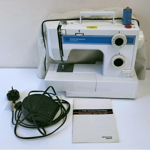 522 - Frister Rossmann Panda MK II Sewing Machine, Tin of Cottons and Go Stitch Machine.