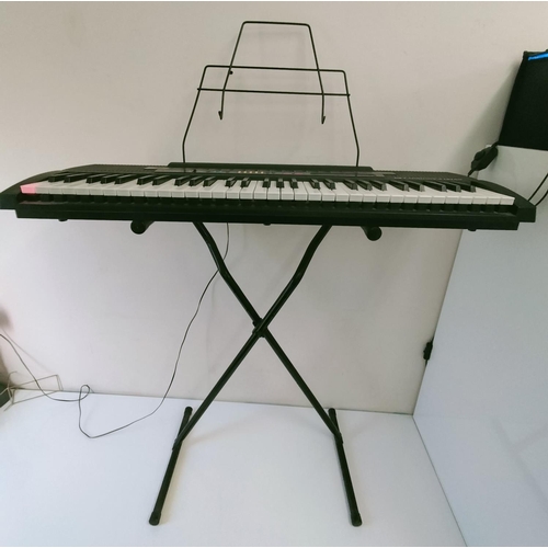 523 - Casio CTK-520L Key Lighting System Keyboard with Stand. W/O. This Lot is Collection Only.