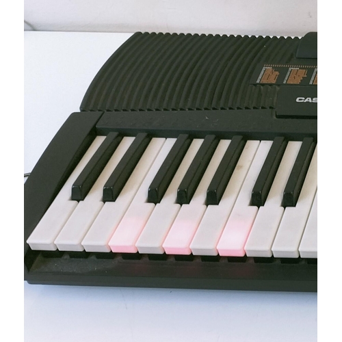 523 - Casio CTK-520L Key Lighting System Keyboard with Stand. W/O. This Lot is Collection Only.