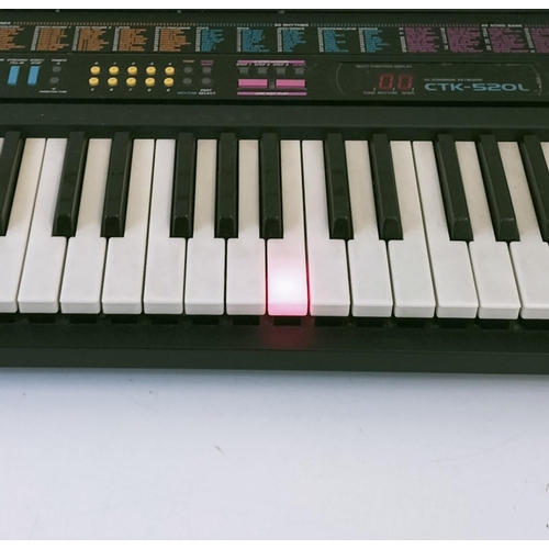 523 - Casio CTK-520L Key Lighting System Keyboard with Stand. W/O. This Lot is Collection Only.