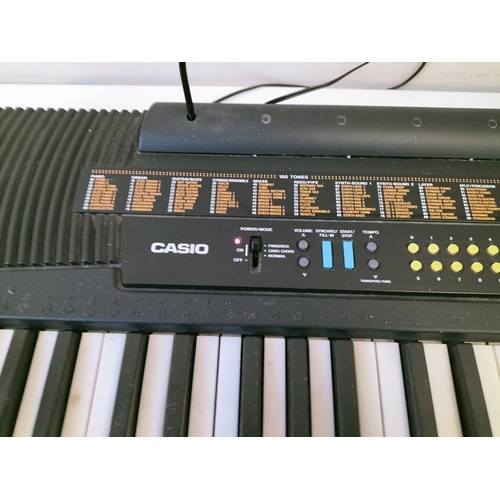 523 - Casio CTK-520L Key Lighting System Keyboard with Stand. W/O. This Lot is Collection Only.