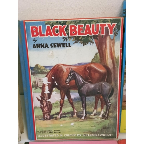 604 - Children's Annuals (6) to include Black Beauty, The Beverly Hillbillies, Bionic Woman, etc.