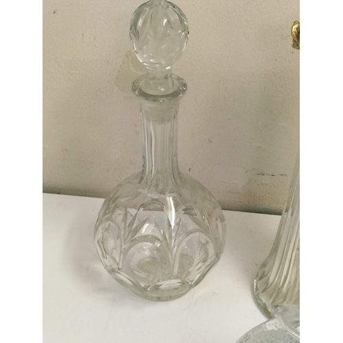 671 - Collection of Decanters plus Paperweight.