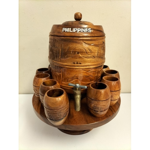 693 - Carved Wooden Wine Dispenser on Stand with 12 Wooden Goblets. Marked Philippines.