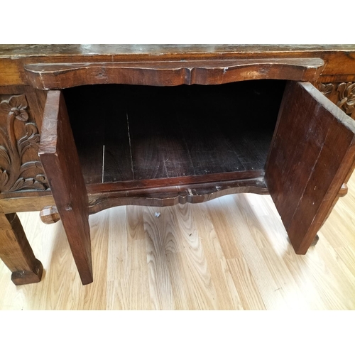 75 - Carved Wooden Drinks/Entertainment Cabinet with Decorative Carved Doors. 100cm x 65cm x 155cm Top of... 