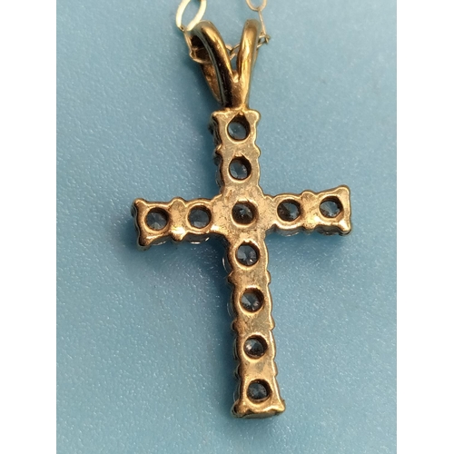 303 - 9ct 375 Stone Set Cross and Chain. Vendors Description.