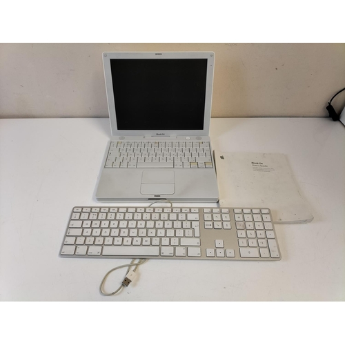 535 - Apple iBook G4 plus Apple Keyboard and Instruction Manual. No Power Cable. Untested.