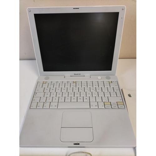 535 - Apple iBook G4 plus Apple Keyboard and Instruction Manual. No Power Cable. Untested.