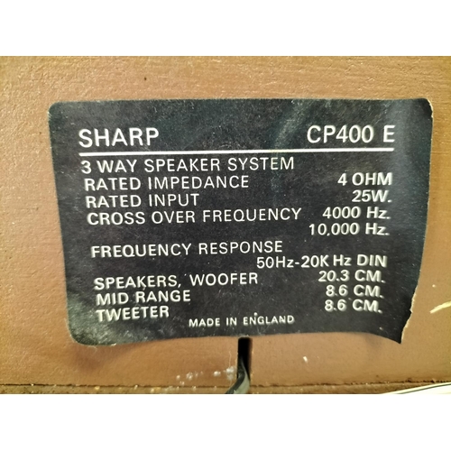 652 - Pair of Sharp CP400E Speakers W/O. 48cm x 26cm x25cm. This Lot is Collection Only.