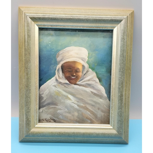 701 - Framed Oil on Board 'The Happy Arab' by J Ridgway. 30cm x 25cm.