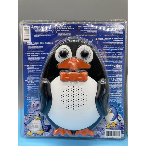 297 - Penguin Shower Radio (As New) plus Extendable Illuminated Mirror.