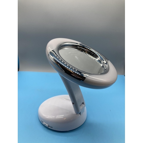 297 - Penguin Shower Radio (As New) plus Extendable Illuminated Mirror.