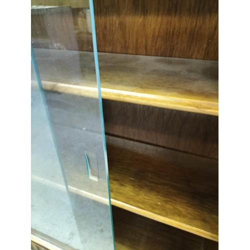 537 - Wooden 3 Shelf Bookcase with Sliding Glass Doors. 92cm High, 91.5cm x 24.5cm. This Lot is Collection... 