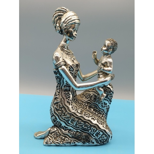 132 - Silver Coloured Resin 25cm Figure of a Mother and Child.