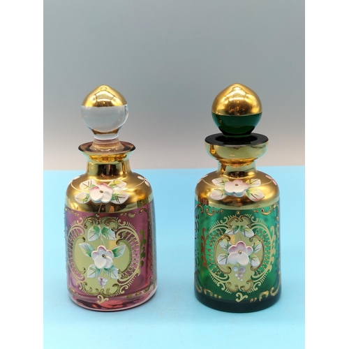 116 - Bohemian Coloured Glass 11.5cm Dressing Table Bottles (2) Decorated with Flowers.