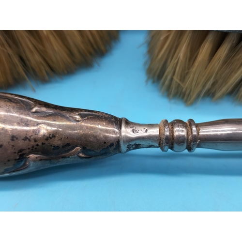 121 - Silver Topped Silver Brushes (2) plus Silver Handled Shoe Horn.