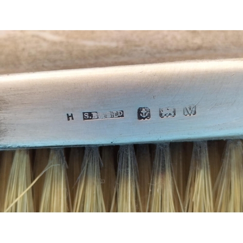 121 - Silver Topped Silver Brushes (2) plus Silver Handled Shoe Horn.