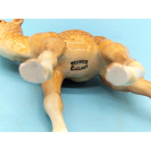130 - Beswick Figure of a Camel Foal 1043. 13cm x 12cm.