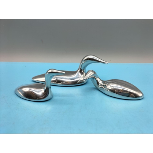 192 - Polished Aluminium Duck Figures (3). Signed to Bases. Largest being 5.5cm High x 15cm.