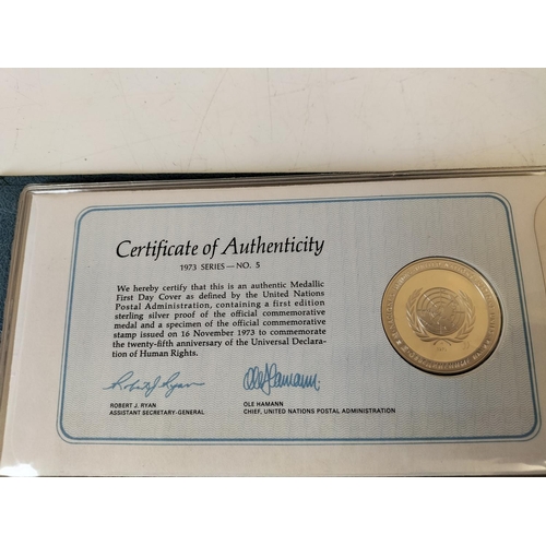 114 - 1973 Official United Nations Medallic First Day covers containing 5 x First Edition Sterling Silver ... 