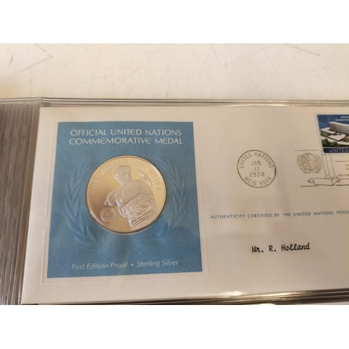 115 - 1974 Official United Nations Medallic First Day Covers containing 5 x First Edition Sterling Silver ... 